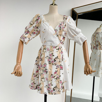 Rochie modernă de damă cu mâneci scurte și decolteu în V