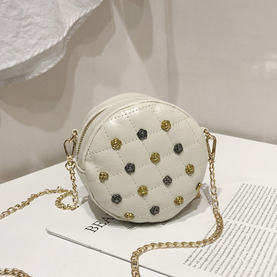 Geanta de dama in forma rotunda cu decor metalic