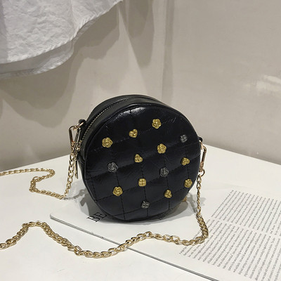 Geanta de dama in forma rotunda cu decor metalic