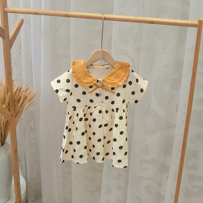 Model de decupat rochie moderna pentru copii cu nasturi si panglica