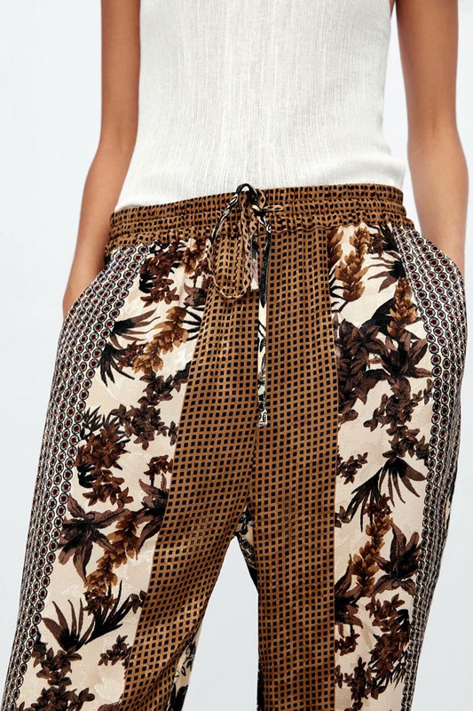 Pantaloni largi de dama cu elastic si cravate in talie de culoare maro cu model