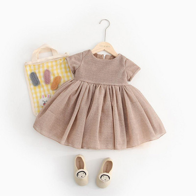 Стилна детска рокля разкроен модел в два цвята