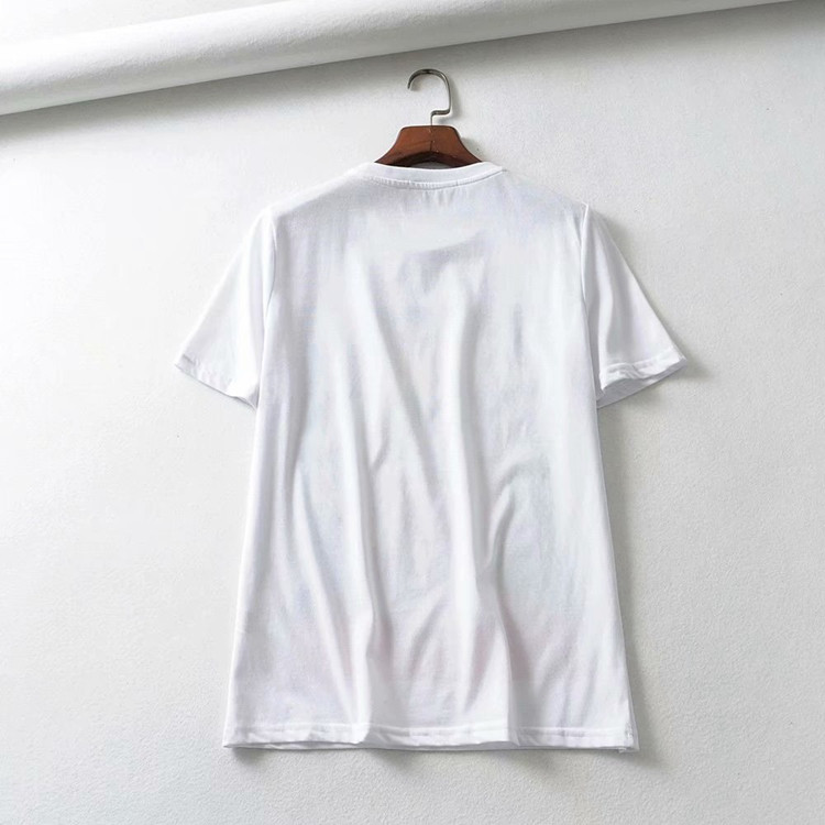 Tricou de dama alb cu maneca scurta decolteu oval si aplicatie