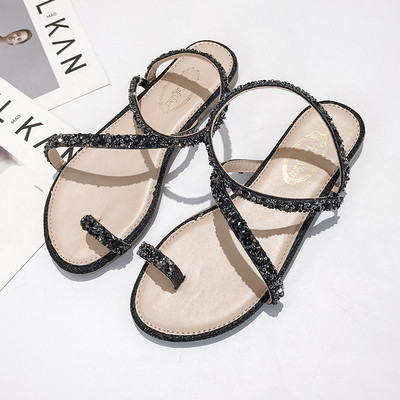 Κομψά γυναικεία σανδάλια σε ασημί και μαύρο χρώμα