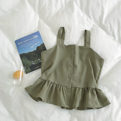 Stílusos női felső, vékony pántokkal és gombokkal, többféle színben