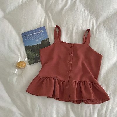 Stílusos női felső, vékony pántokkal és gombokkal, többféle színben