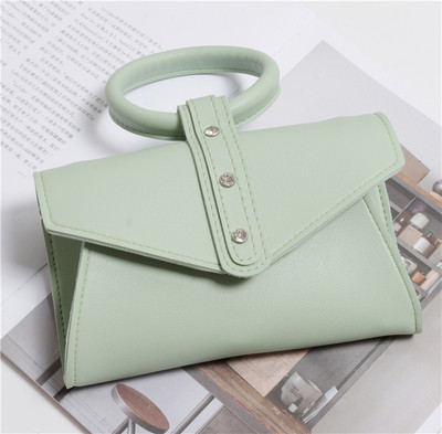 Eko bőrből készült alkalmi női táska rövid és hosszú füllel, több színben