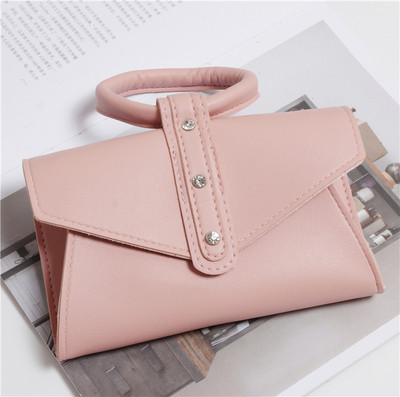 Eko bőrből készült alkalmi női táska rövid és hosszú füllel, több színben