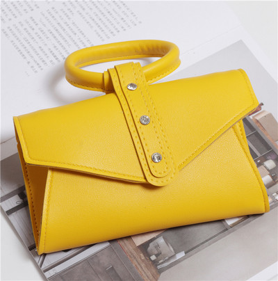 Eko bőrből készült alkalmi női táska rövid és hosszú füllel, több színben