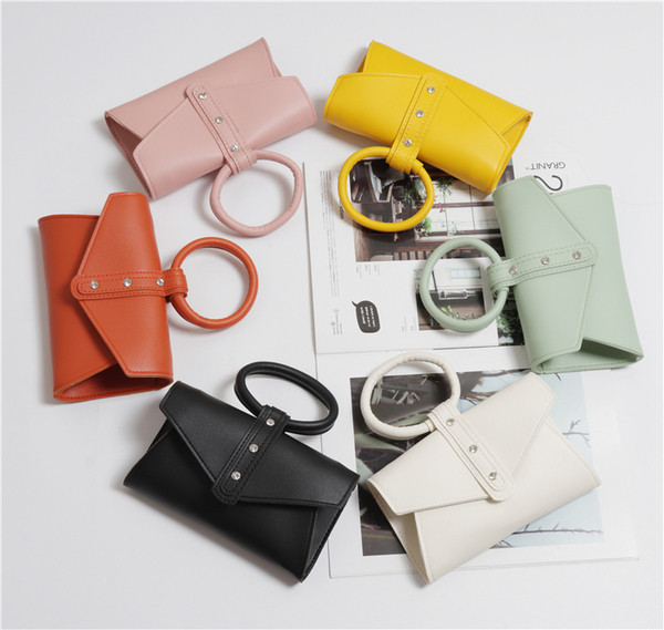 Eko bőrből készült alkalmi női táska rövid és hosszú füllel, több színben