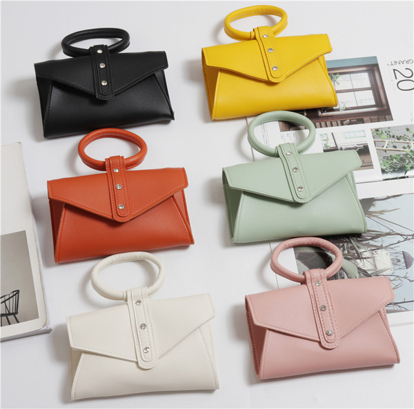 Eko bőrből készült alkalmi női táska rövid és hosszú füllel, több színben