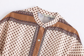 Lezser női hosszú ruha teljes hosszában gombokkal, derekán megkötővel