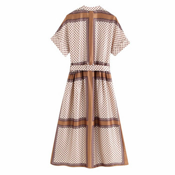 Lezser női hosszú ruha teljes hosszában gombokkal, derekán megkötővel