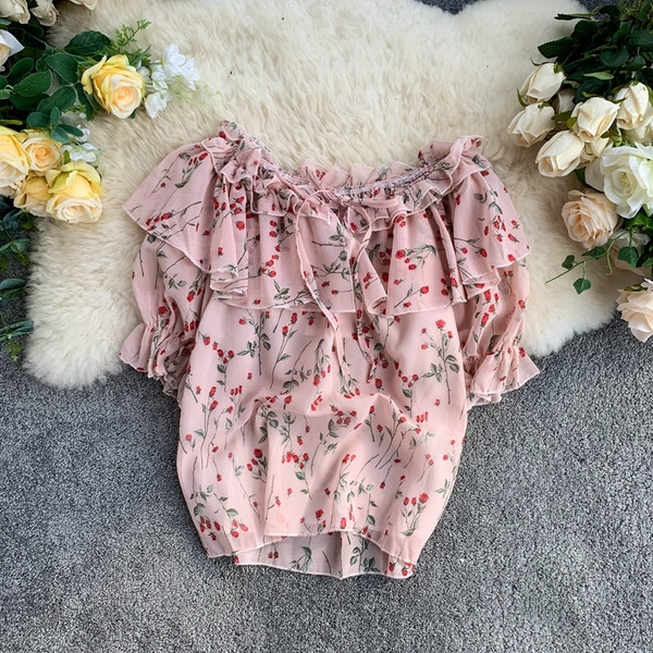 Rózsaszín virágmintás női blúz