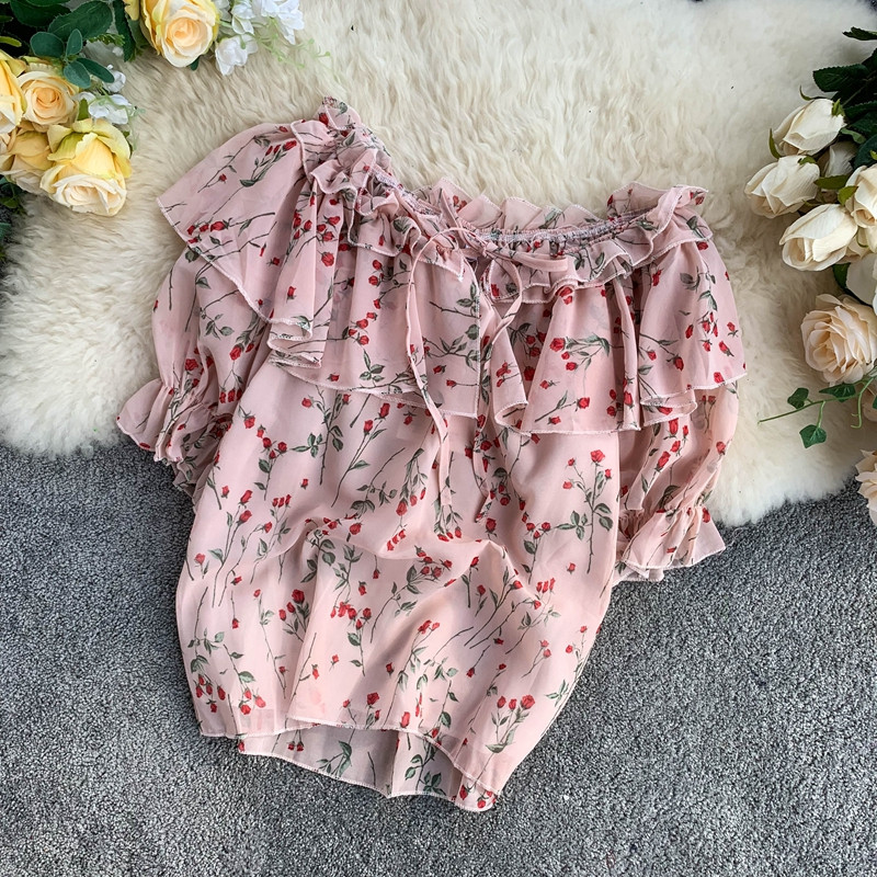 Rózsaszín virágmintás női blúz