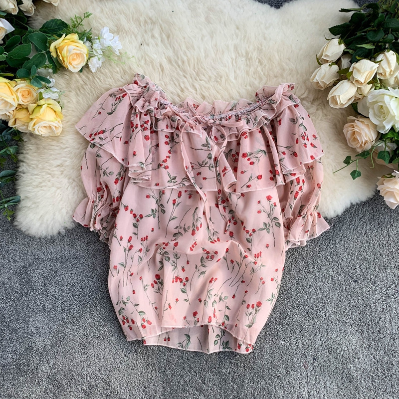 Rózsaszín virágmintás női blúz