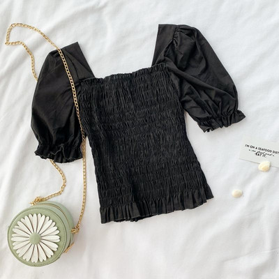 Bluză de damă cu mâneci scurte în alb și negru