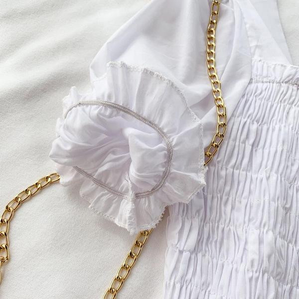 Bluză de damă cu mâneci scurte în alb și negru