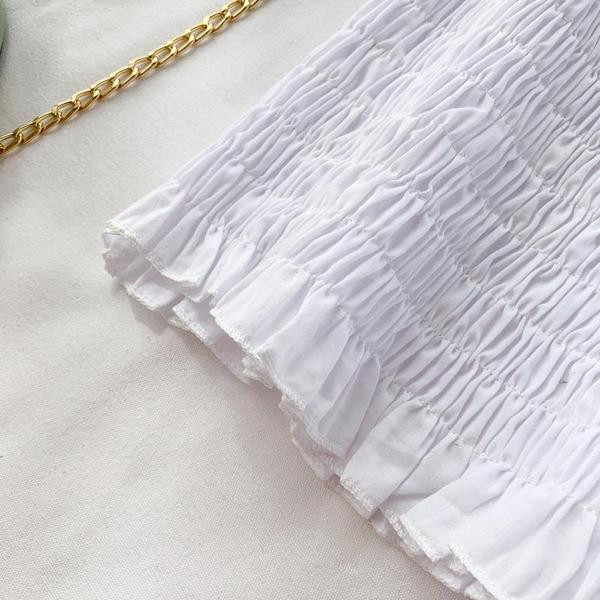 Bluză de damă cu mâneci scurte în alb și negru