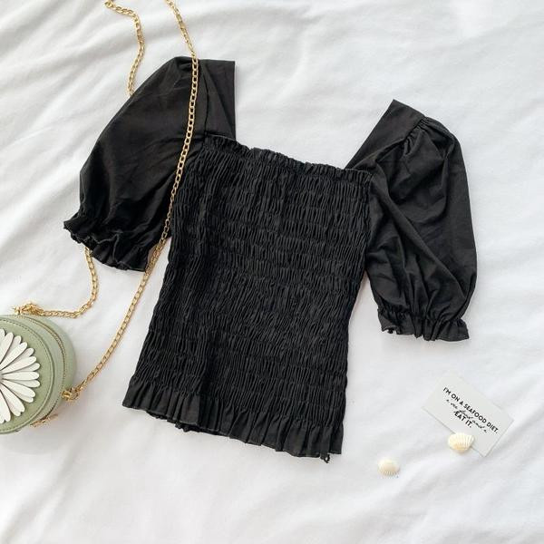 Bluză de damă cu mâneci scurte în alb și negru