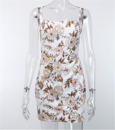 Modern női ruha vékony pántokkal és virágmotívummal