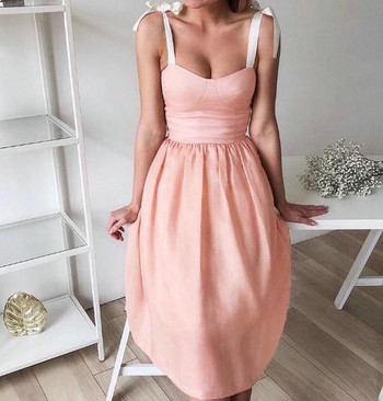 Modern női ruha rózsaszín és zöld szalaggal