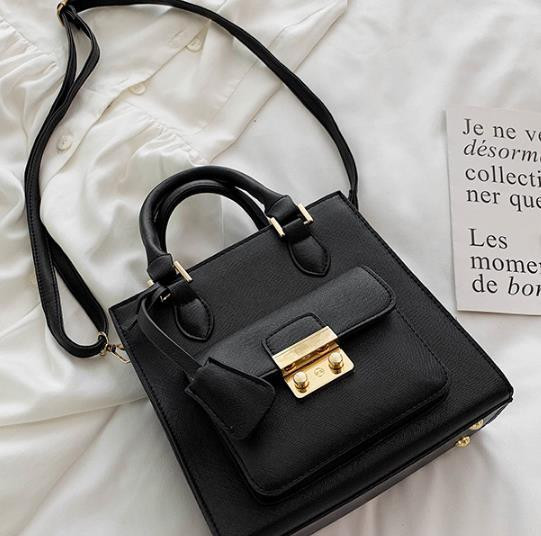 Modern női táska elülső zsebbel, négy színben