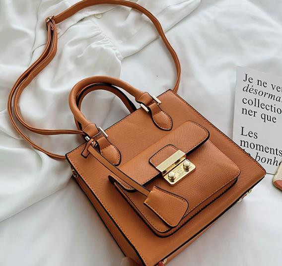 Modern női táska elülső zsebbel, négy színben