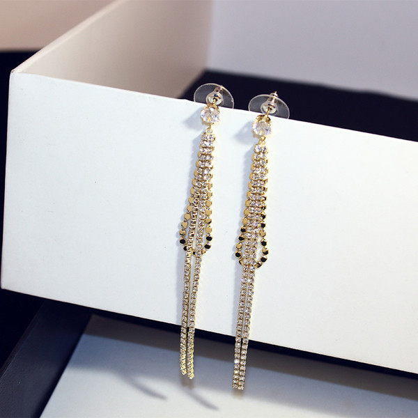 Cercei lungi de dama - de culoare aurie cu pietre