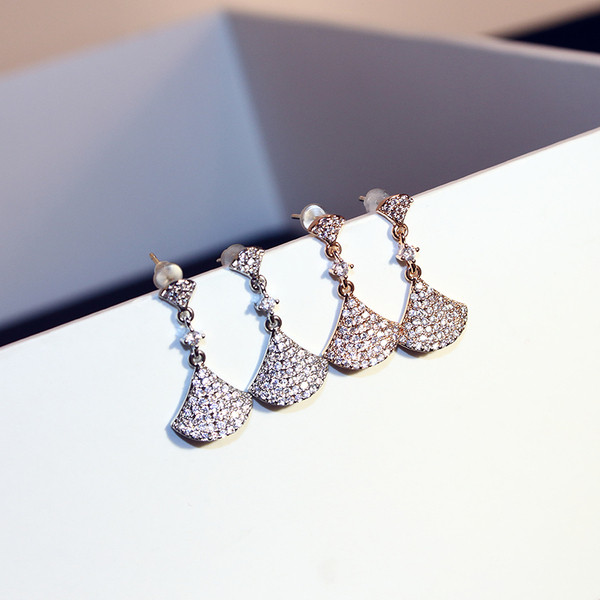 Cercei eleganti de dama - in doua culori cu pietre