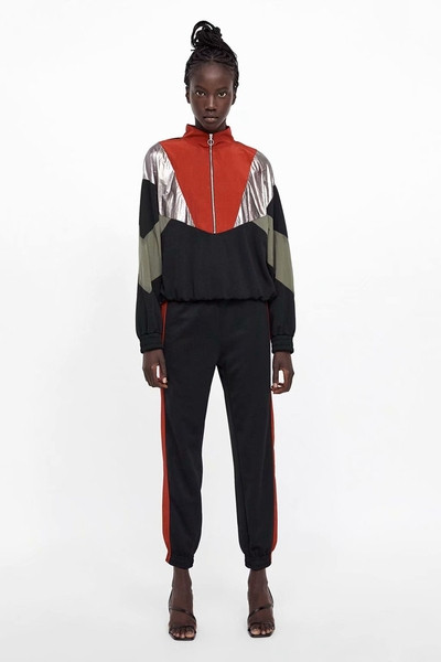 Pantaloni sport de damă cu elastic în talie și glezne și margine laterală