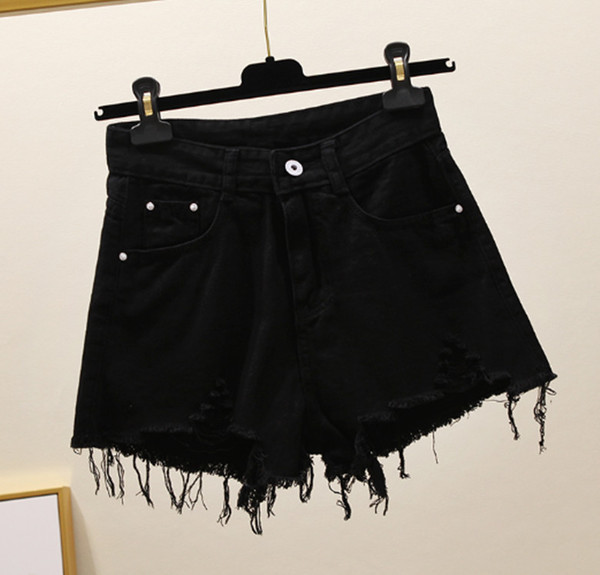 Pantaloni scurți de damă cu motive rupte în trei culori