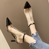 Stílusos női magas sarkú cipő fehér és fekete színben - hegyes modell