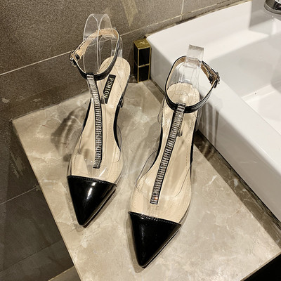 Stílusos női magas sarkú cipő fehér és fekete színben - hegyes modell