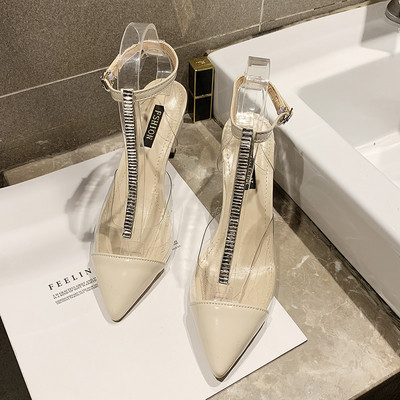 Stílusos női magas sarkú cipő fehér és fekete színben - hegyes modell