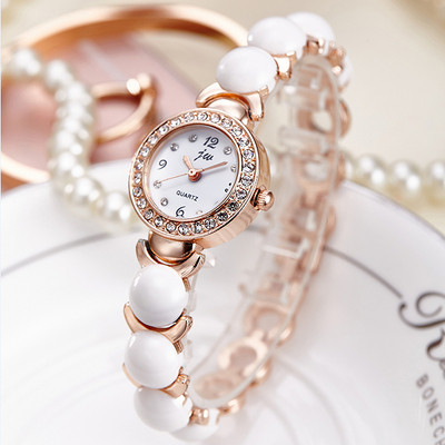 Модерен дамски часовник в бял цвят с камъни