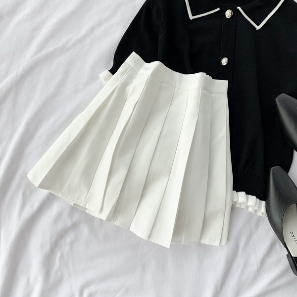 Дамска къса пола в бял и черен цвят