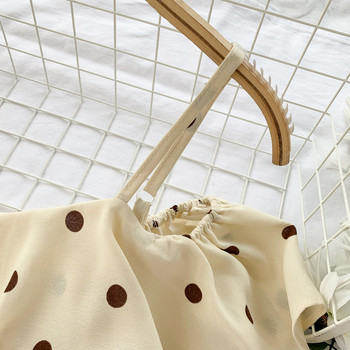 Дамска рокля на точки в два цвята