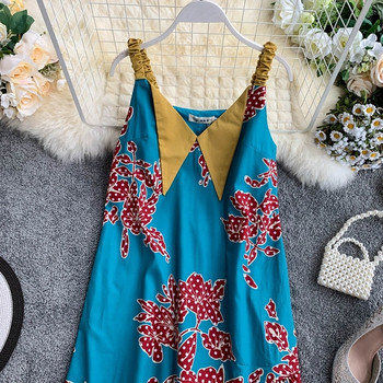 Модерна дамска асиметрична рокля с тънки презрамки в син цвят