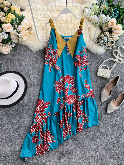 Модерна дамска асиметрична рокля с тънки презрамки в син цвят