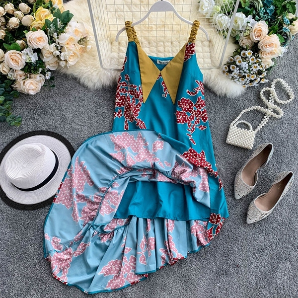 Модерна дамска асиметрична рокля с тънки презрамки в син цвят