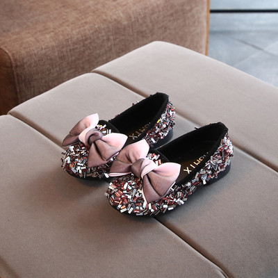 Актуални детски обувки в три цвята с панделка