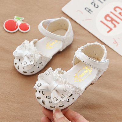 Модерни детски сандали в три цвята с панделка 