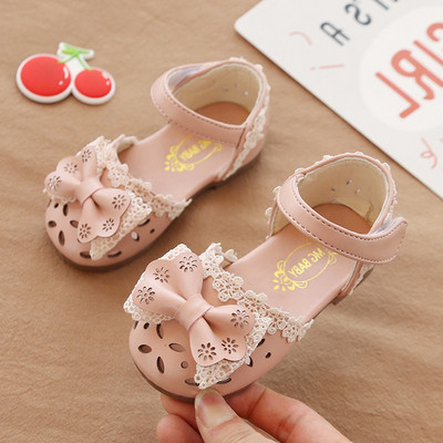 Модерни детски сандали в три цвята с панделка 