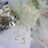 Актуално дамско колие в златист цвят с камъни