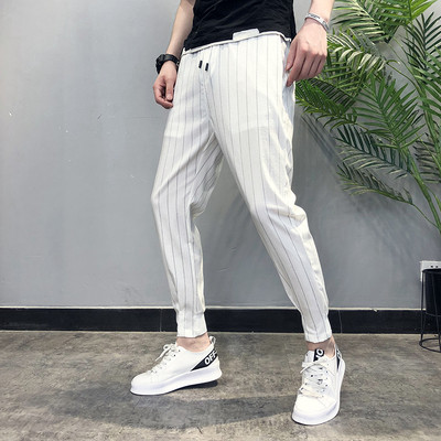 Pantaloni la modă pentru bărbați cu legături în alb-negru