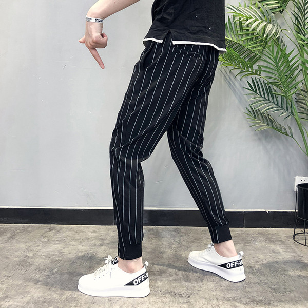 Pantaloni la modă pentru bărbați cu legături în alb-negru