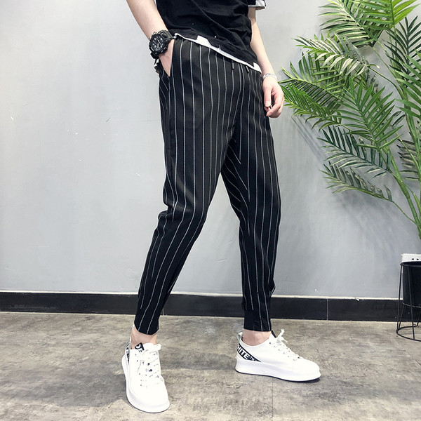 Pantaloni la modă pentru bărbați cu legături în alb-negru