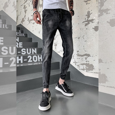 Blugi moderni pentru bărbați de culoare gri cu șireturi și buzunare