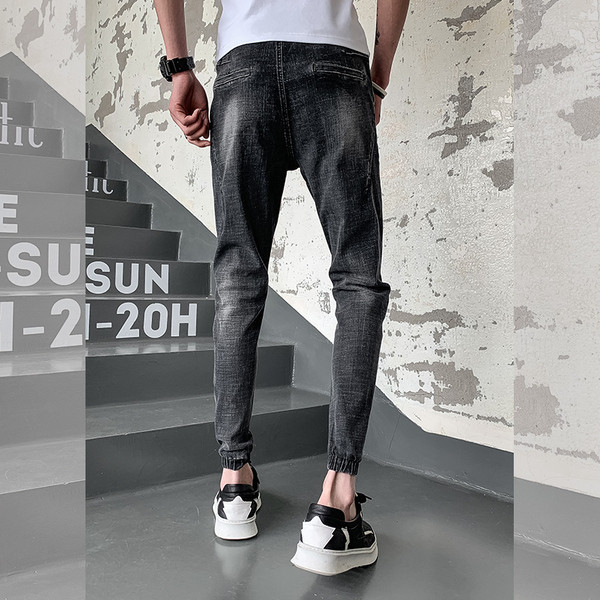 Blugi moderni pentru bărbați de culoare gri cu șireturi și buzunare